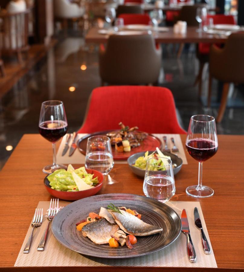 Moevenpick Hotel Istanbul Asia Airport Ngoại thất bức ảnh A table set for dinner
